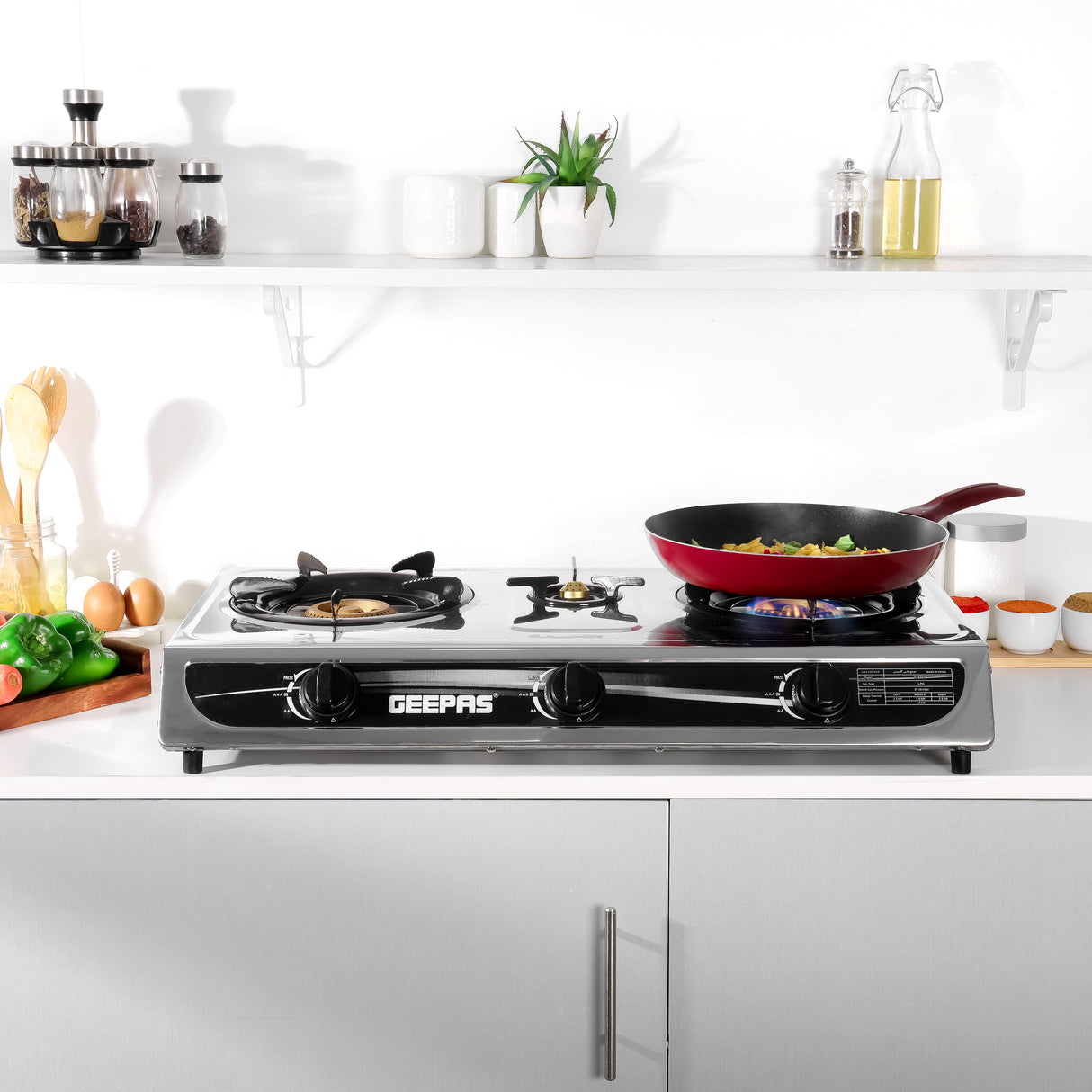 Geepas GK6857 Triple Burner Gas Cooker | Stainless Steel Body| 3 Burners| Auto Ignition System | 5.60kW Powerful Heat Output | Easy Cleaning Design & 2-Year Warranty