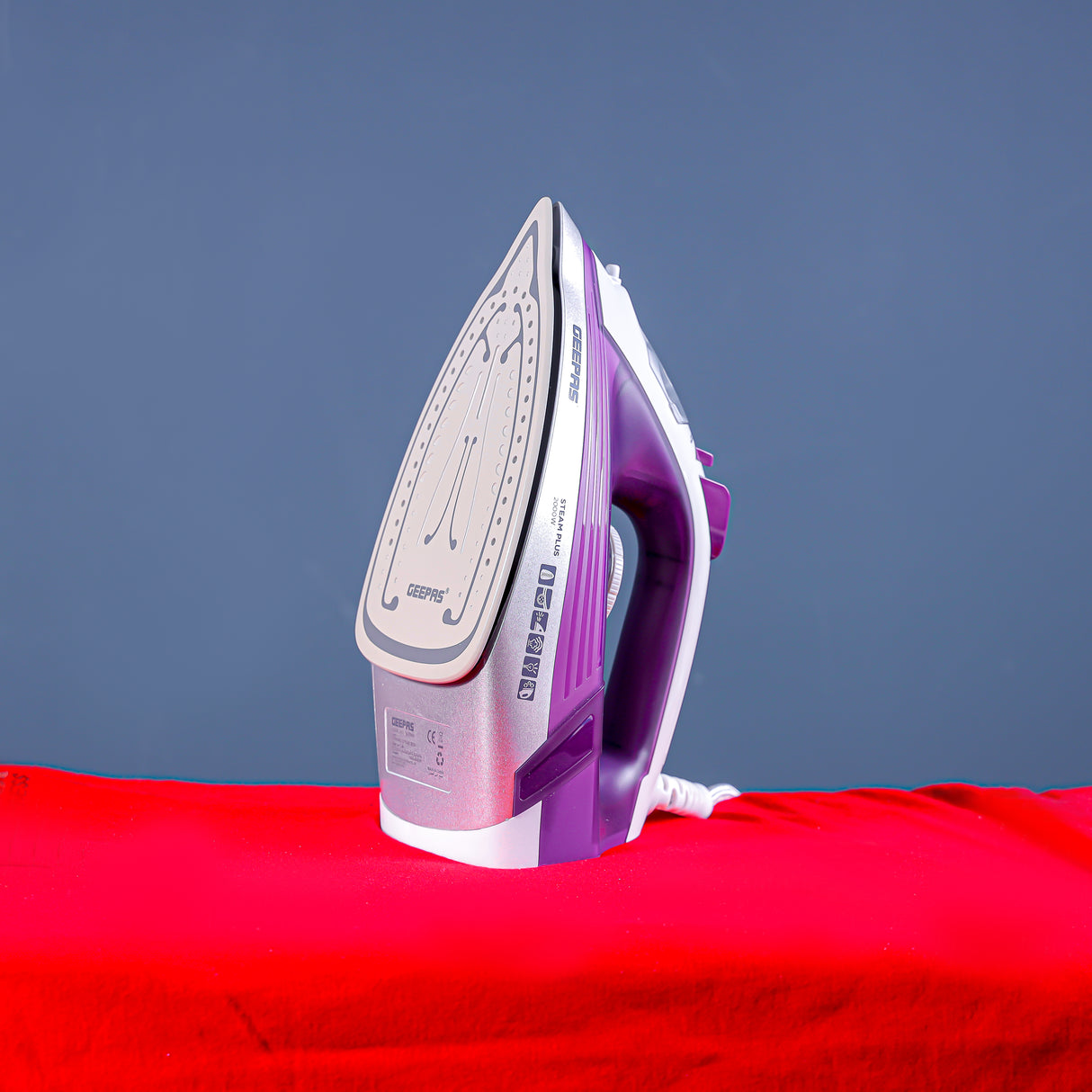 Geepas GSI7786 Ceramic Steam Iron | 2000W Power | 220ml Water Tank| Adjustable Steam Control | 360° Swivel Cord | Self-Cleaning & Anti-Drip Function| 2-Year Warranty