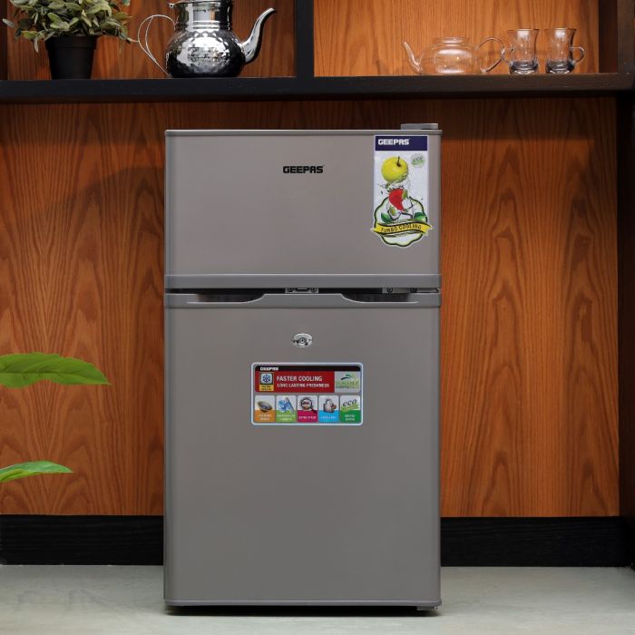 Geepas 125 L Double Door Defrost Refrigerator- GRF1259GPE| Rapid Cooling, Tropic Type And CFC-Free| Tempered Glass Shelves, Extra Space And Long Lasting Freshness