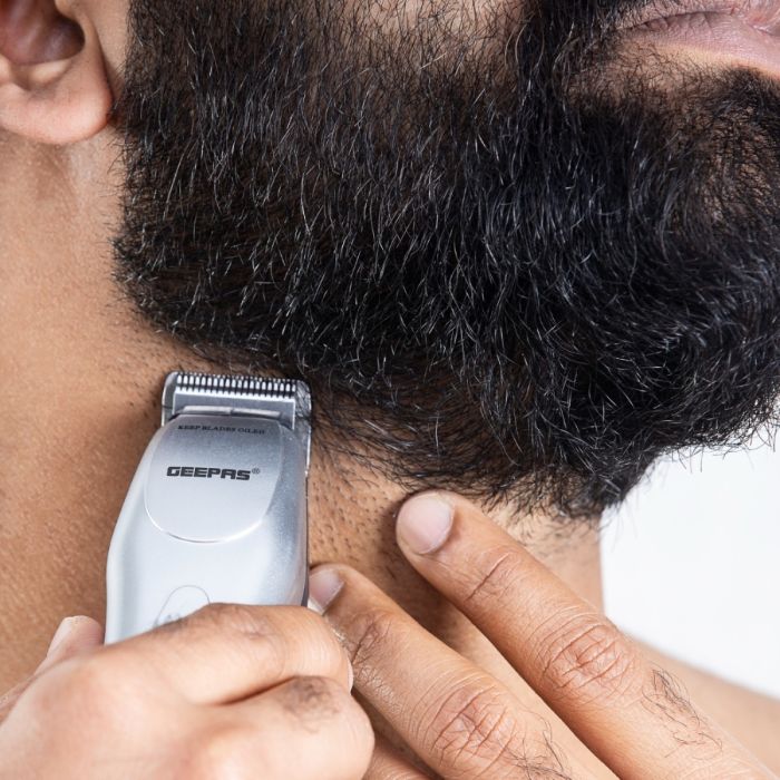 Geepas Rechargeable Trimmer 3W -  Portable Comfortable Grip, Chromium Steel Blade, Cordless Operation, LED Charge Indication | Cordless Rechargeable Trimmer with 5 Combs & Charging Stand