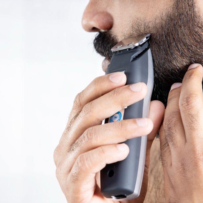 Geepas Rechargeable Trimmer 3W -  Portable Comfortable Grip, Chromium Steel Blade, Cordless Operation, LED Charge Indication | Cordless Rechargeable Trimmer with 5 Combs & Charging Stand