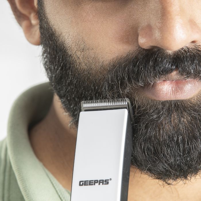 Geepas Rechargeable Hair Clipper - Grooming Kit with Comfortable Grip, Stainless Steel Precision Cutting Blade, Cordless Operation, Indicator Light with 30 Minute Working | Ideal for Short & Long Hairs | 2 Years Warranty