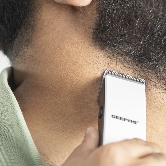 Geepas Rechargeable Hair Clipper - Grooming Kit with Comfortable Grip, Stainless Steel Precision Cutting Blade, Cordless Operation, Indicator Light with 30 Minute Working | Ideal for Short & Long Hairs | 2 Years Warranty