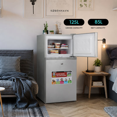 Geepas GRF1259GPE 125L Double Door Refrigerator |85L Net Capacity |double door design |High-performance tropical compressor |Adjustable thermostat |tempered glass shelves