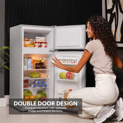 Geepas GRF1259GPE 125L Double Door Refrigerator |85L Net Capacity |double door design |High-performance tropical compressor |Adjustable thermostat |tempered glass shelves