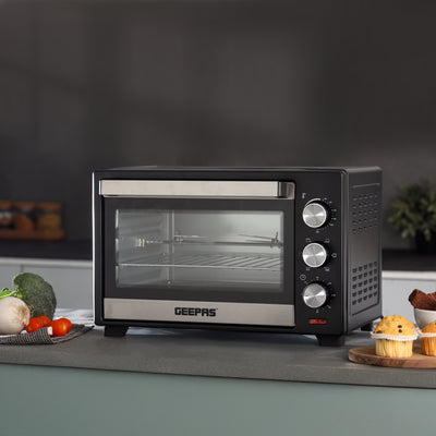 Geepas GO4466 Electric Oven with Rotisserie | 24L Capacity | 1600W Power | Adjustable Temperature Control | 60-Minute Timer | Perfect for Baking, Grilling, and Roasting