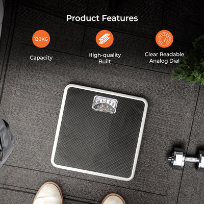 Geepas Mechanical Health Scale-GBS4169N /Multi-Purpose Weighing Machine /High Precision, Calibration Wheel/130 kg Capacity, with Step-On Technology/Black,2 Years Warranty