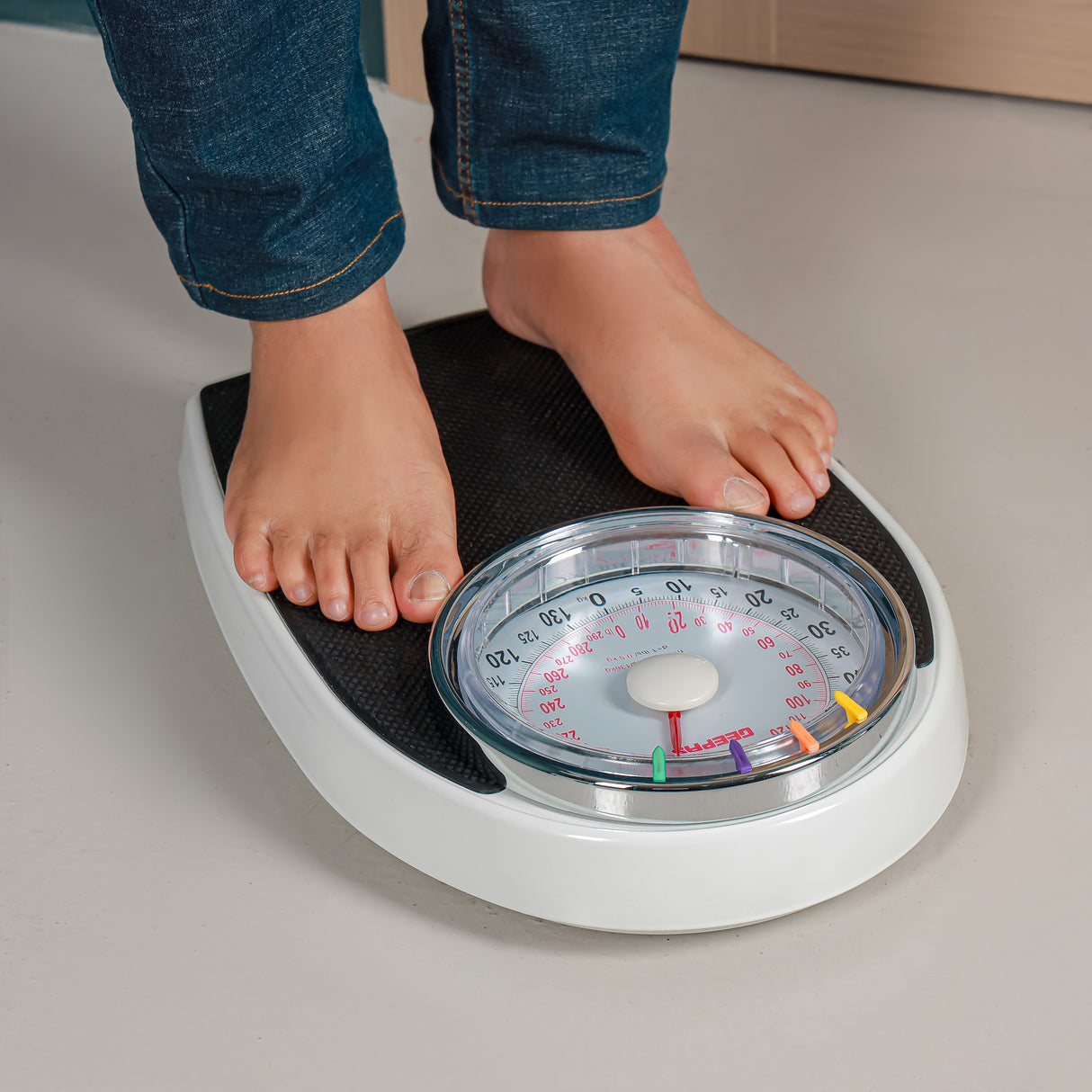 Geepas Mechanical Personal Scale- GBS46528UK/ 136KG Capacity, High Precision Dial, Metal Body, Leather Surface, Step-On Tech, Multi-Purpose Use, White & Black, 2Y Warranty