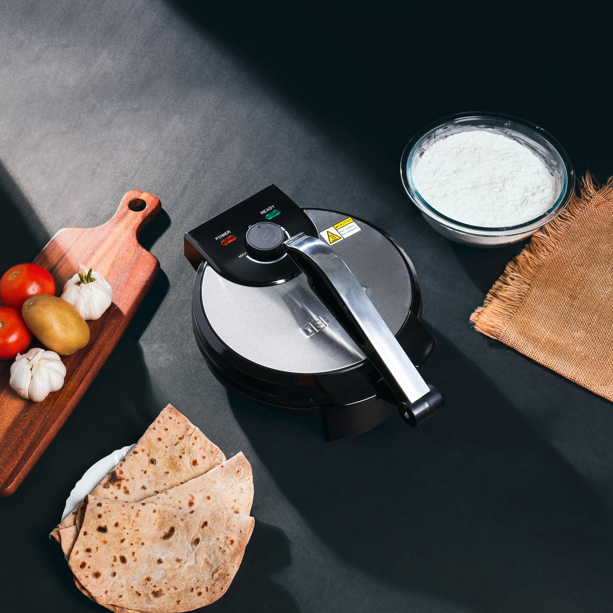 Geepas 10" Chapathi Maker- GCM6125| Non-Stick Plates For Easy Food Release Mechanism And Easy Cleaning, Adjustable Temperature| Strong And Sturdy Construction With An Anti-Skid Base| Easy Round Chapathi, Papad, Roti And Puri Maker With Handle