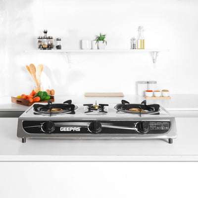 Geepas GK6857 Triple Burner Gas Cooker | Stainless Steel Body| 3  Burners| Auto Ignition System | 5.60kW Powerful Heat Output | Easy Cleaning Design & 2-Year Warranty
