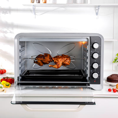 Shop the Geepas 80L Electric Oven with rotisserie, convection function, 120-minute timer, and stainless steel heater. Perfect for roasting, baking, and grilling.