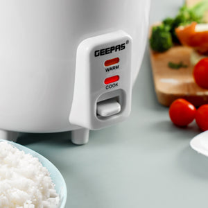 Geepas Personal Rice Cooker GRC1828 | 0.6L Compact Capacity | Ideal for Cooking & Keeping Food Warm |  Energy Efficient, Easy to Clean & Durable Design | 2 Years Warranty