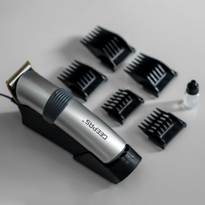 Geepas GTR8684 Professional Hair Clipper | Cordless & Rechargeable Trimmer with Stainless Steel Blade |Adjustable Razor | 5 Combs | Brush, Oil & 8-Hour Charging