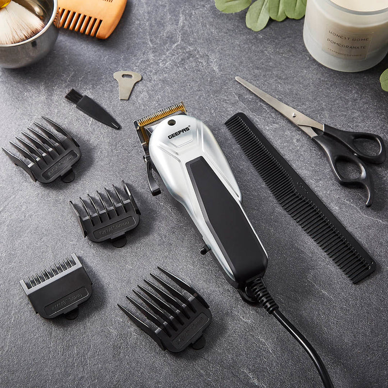 Geepas GTR8658N Professional Hair Clipper | Gold Titanium Carbon Steel Blade | Adjustable Control Lever | Magnetic Motor | 4 Detachable Combs | Barber Accessories