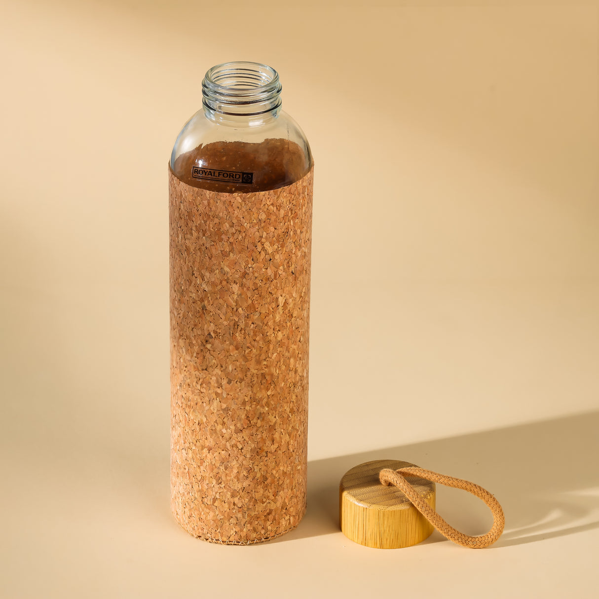 Royalford RF11925 glass water bottle 500ml| cork sleeve and bamboo lid with BPA-free, leak-resistant| durable, eco-friendly design, ideal for travel, office, & daily use|
